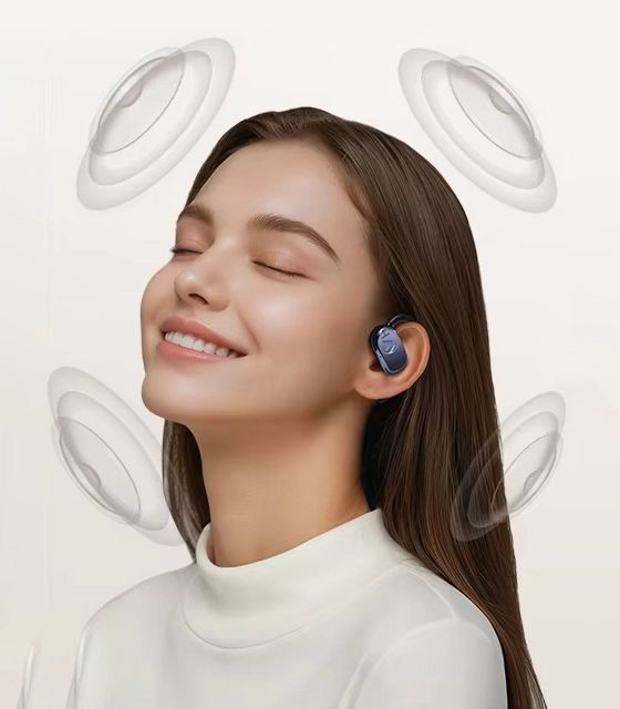 Woman listening to music with Haylou Earhook 1 earphones