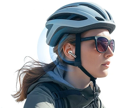 Woman cycling and using Haylou Mori Pro