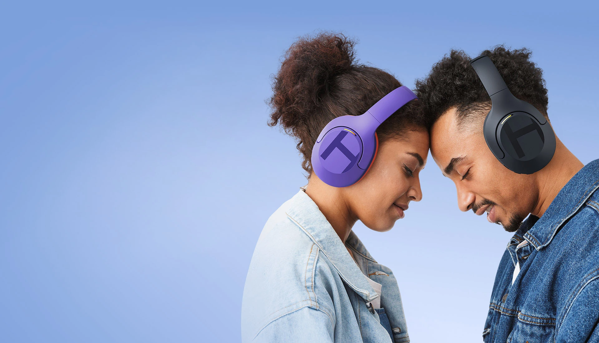 Man and woman listening to Haylou S35 ANC headphones