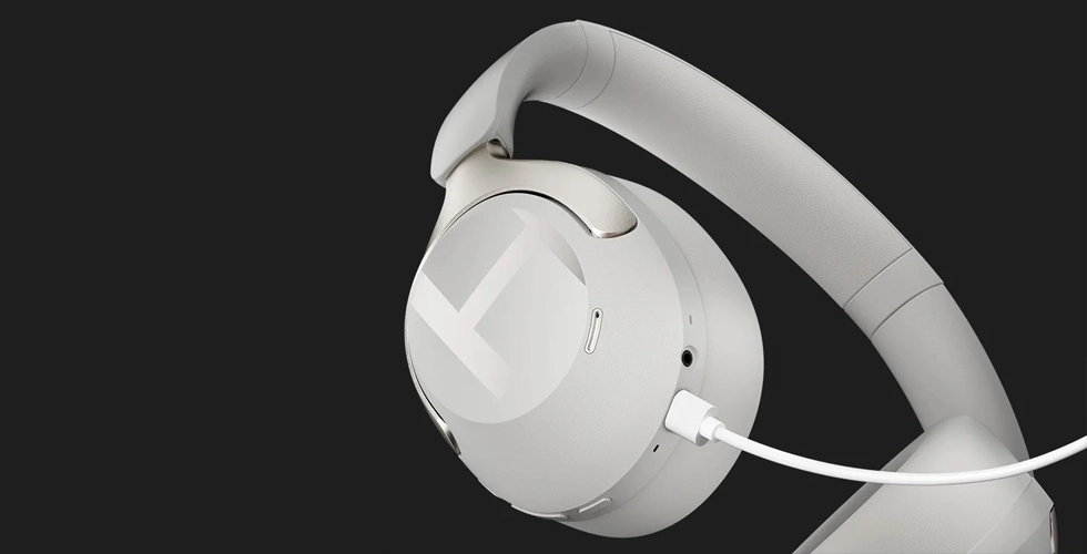 Haylou S40 charging with white cable connected