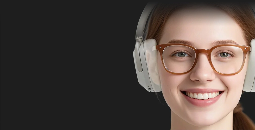 Smiling woman wearing Haylou S40 headphones and glasses