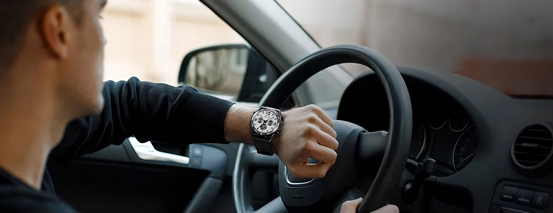 Haylou Watch R8 on a driver's wrist