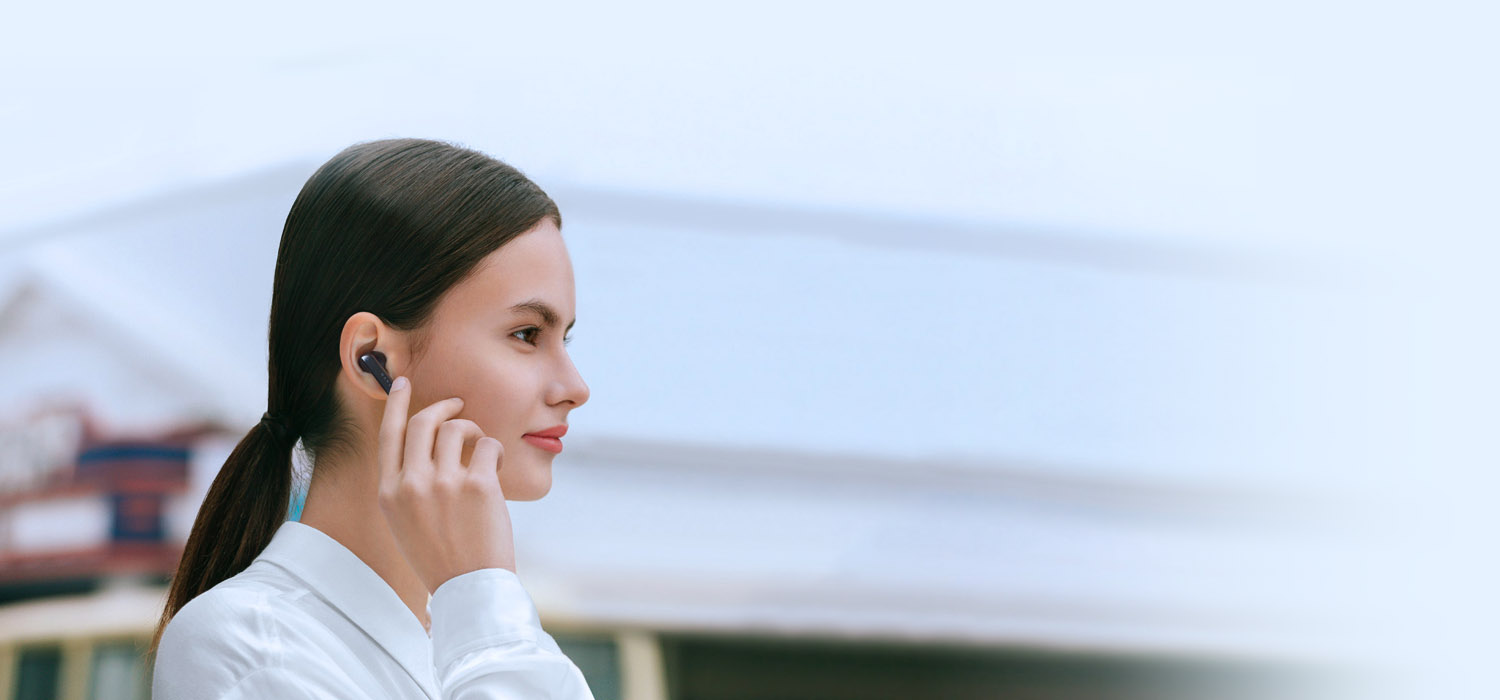 Photo of a woman wears Haylou X1 Pro earbuds